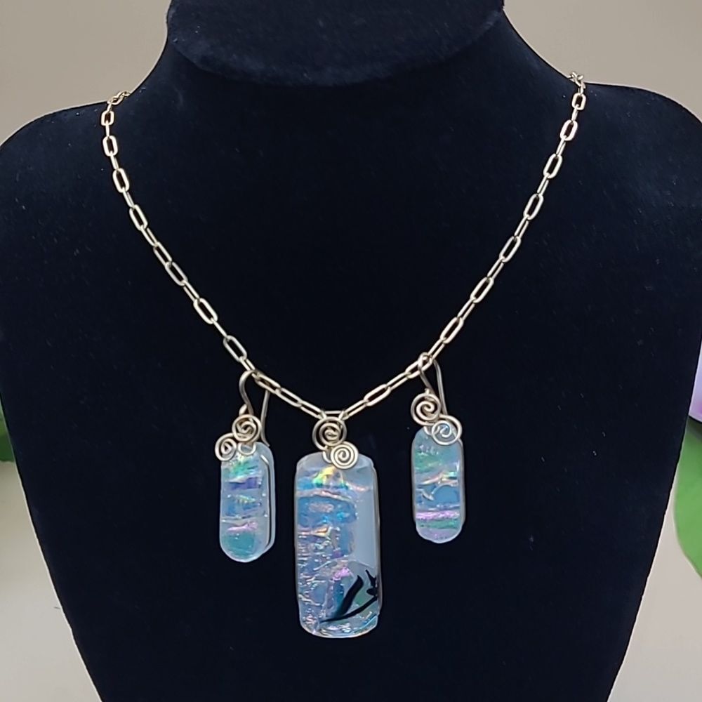 Dichroic glass iridescent white necklace and earrings. Gold chain and wrappings